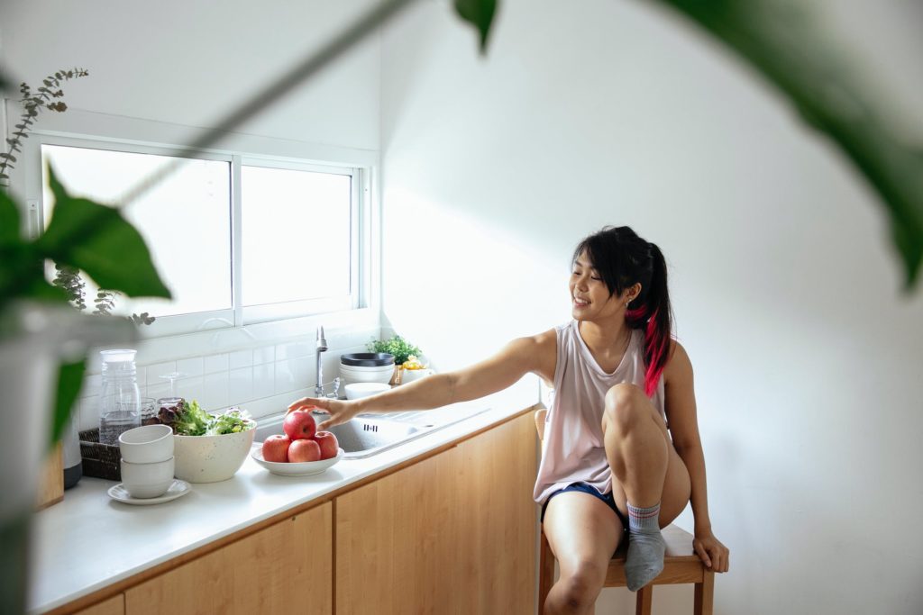 Tips for Making Your Home a Place of Healing 9 a woman holding a baby