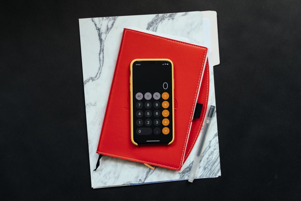 How to Make a Health Insurance Claim 9 a calculator in a red case