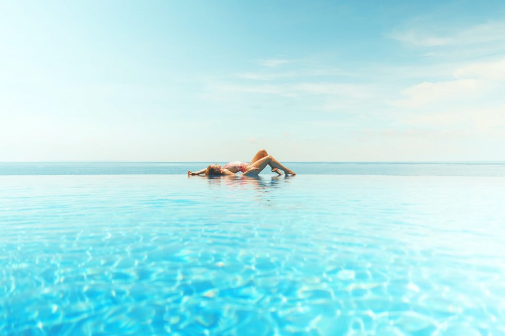Tips for Keeping Yourself Cool This Summer 16 a couple of animals in the water