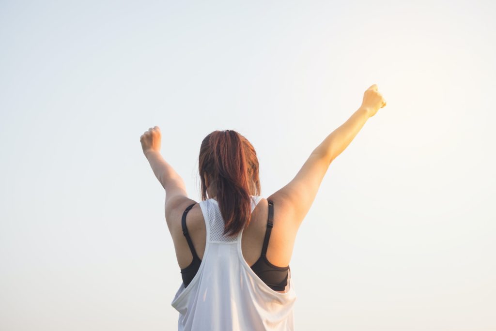 a person holding the hands up