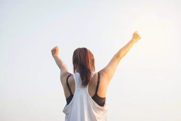 a person holding the hands up