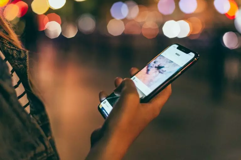 a person holding a cell phone