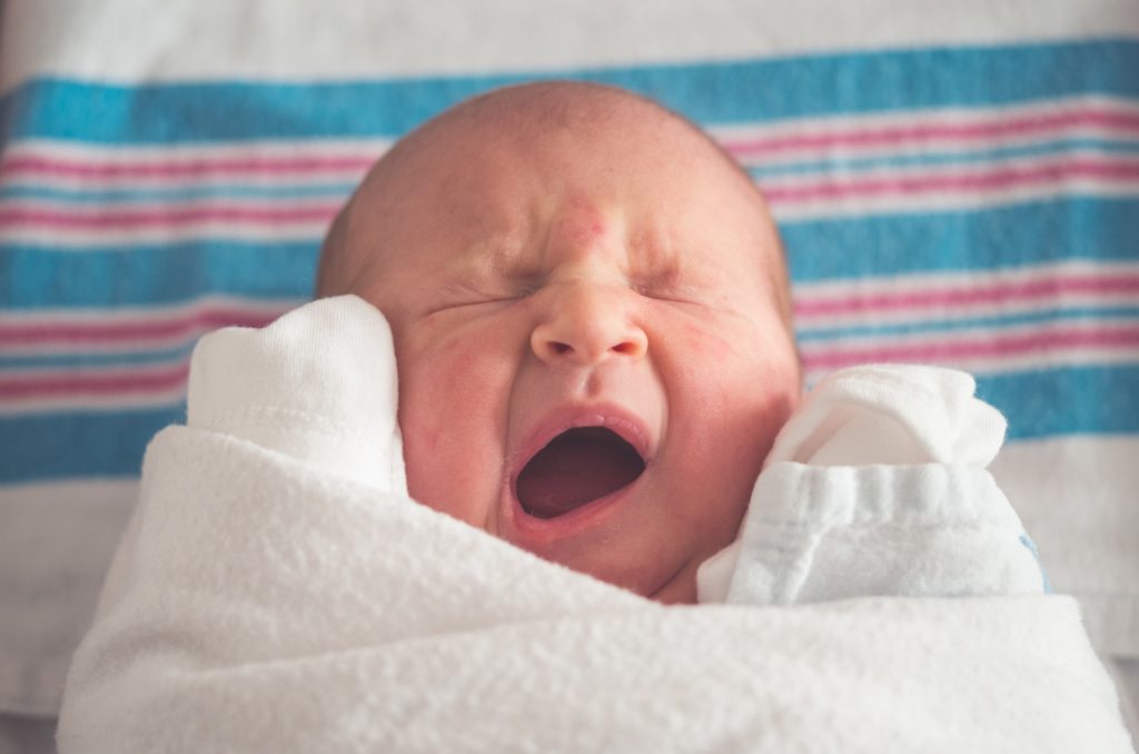 a baby with its mouth open